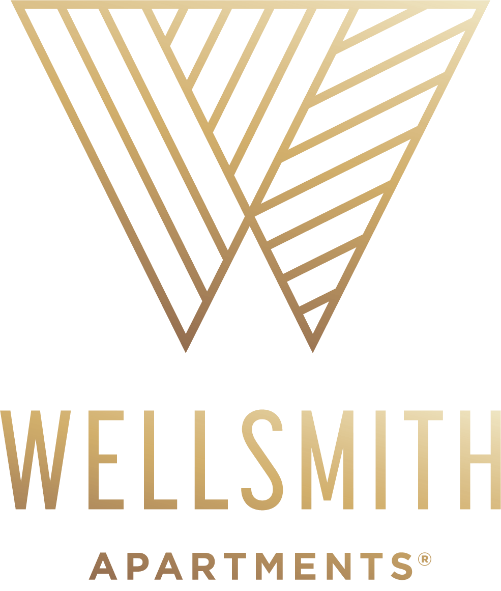 The image is a logo of Wellsmith Apartments.